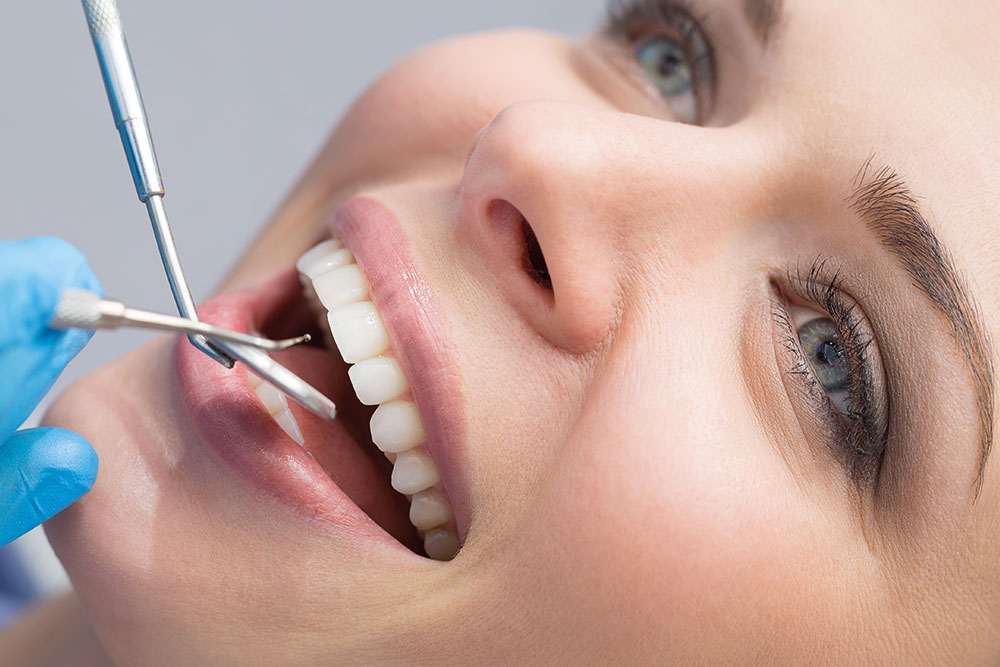 Woman getting dental treatment
