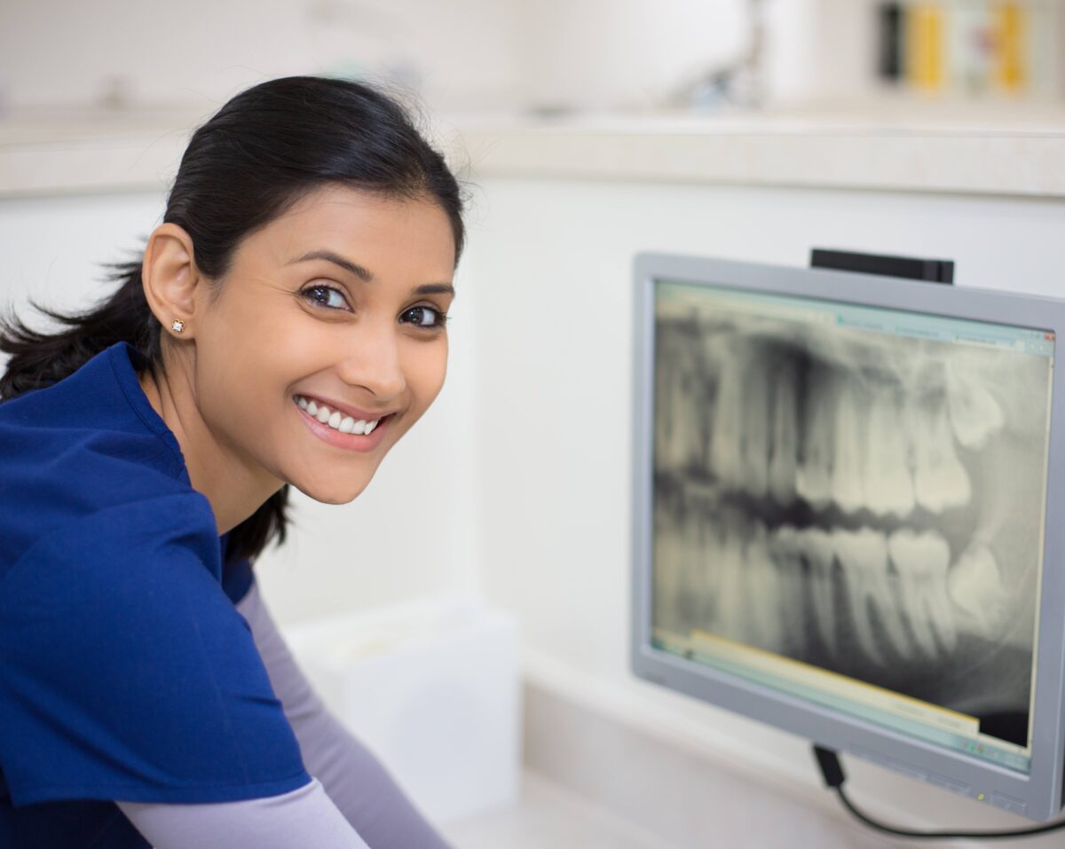 Dental Assistant at a Computer