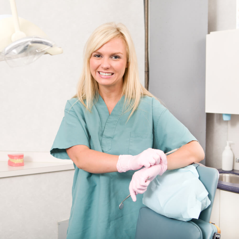 Nurse smiling while standing